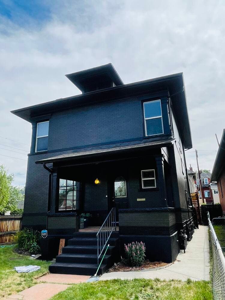 Full exterior repaint on a black four square