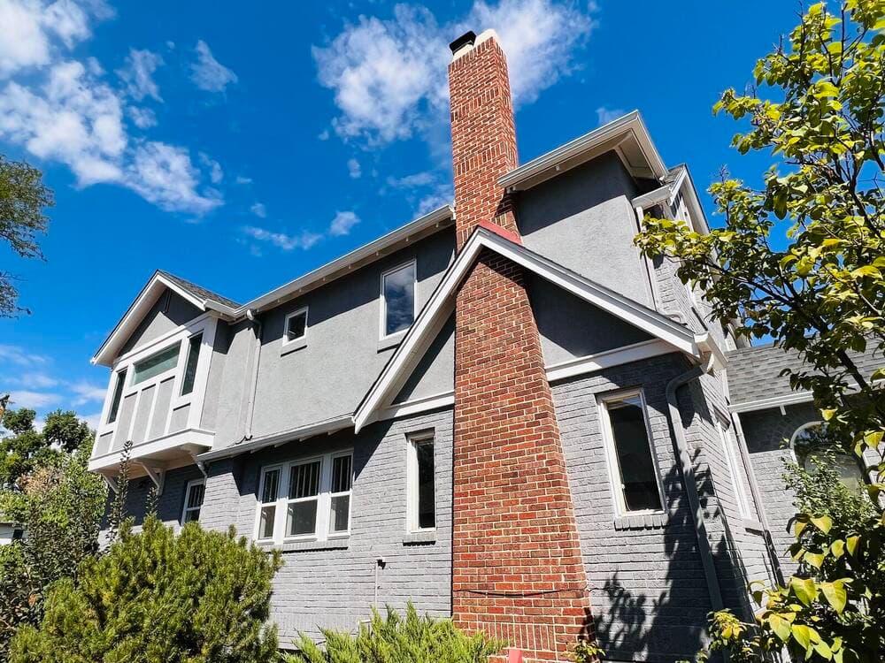 Repainted stucco and brick exterior